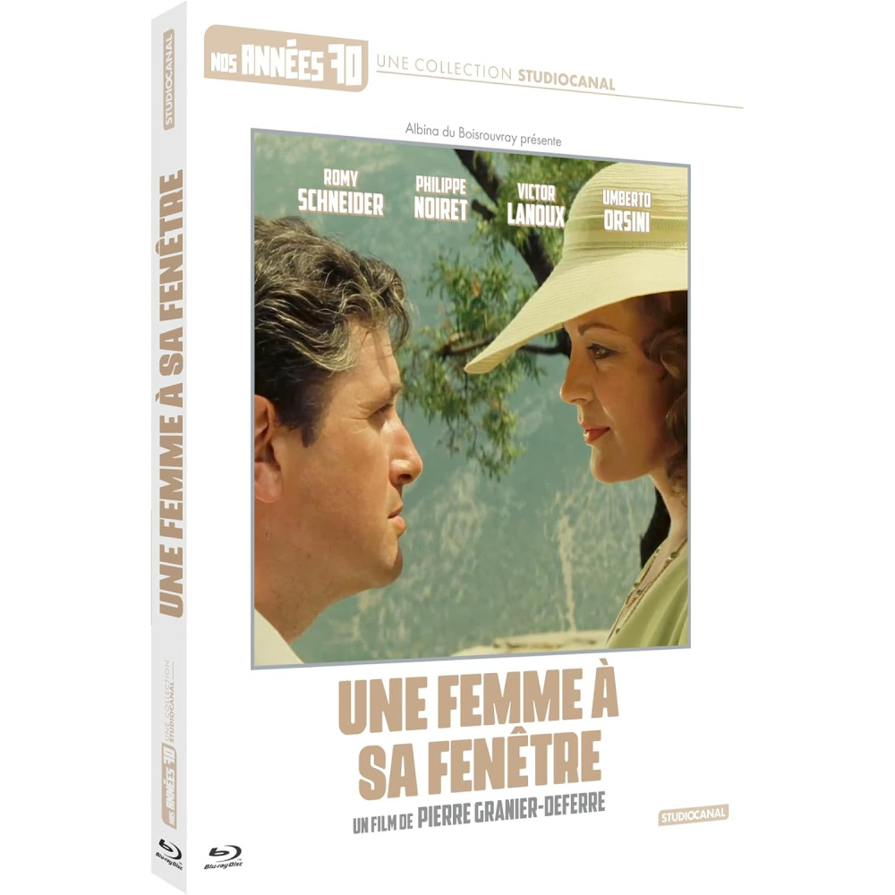 UNE FEMME A SA FENETRE